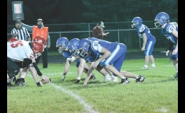 The Viking defense awaits the snap of the ball during a recent game against Riceville.