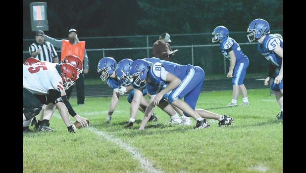 The Viking defense awaits the snap of the ball during a recent game against Riceville.