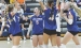 The Vikings celebrate consecutive ace serves during set two on Thursday night against Lake Mills.