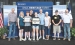 Iowa Secretary of Agriculture Mike Naig (left) and Iowa Farm Bureau Federation President Brent Johnson (right) presented the Rugland family with the Iowa Heritage Farm award at a ceremony on August 20 during the Iowa State Fair.