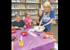 Worth County 4-H recently partnered with the Northwood Public Library for a variety of activities. That included using chia seeds to create characters. They also painted garden rocks. And they also used bird seed to create feeders to hang in trees.