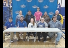 Last week state-bound Northwood-Kensett Viking wrestler Jessi Ausborn signed her letter of intentent to compete on the NIACC wrestling team next year. Pictured are (front row, from left) assistant NIACC coach Irvin Gomez, N-K coach Christian Miller, Jessi Ausborn, her parents Kristy and Larry Ausborn, (back row) grandparents Vicky and Virgil Fett, brother TJ Ausborn and grandparents Sue and Terry Ausborn.