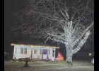 An evening drive through the city of Northwood provides a look at several shining examples of lighted holiday decorations of all kinds. Pictured above are just two of the bright efforts in Northwood. 
