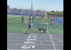 Ivy Urbatch winning the 1500 at the Mike Henderson Middle School State Meet.