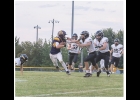 Senior Zach Stene surpassed 100 yards finishing with 107 on just 6 carries for the Bulldogs. Stene, Delger and Kjeldahl held their own in the rushing game and will look to add on. Photo - Knute Rogne
