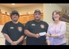 Dedra Harris presented a $1,000 check to Jake Springer, 2nd assistant chief at the Northwood Volunteer Fire Company, and Lt. Isaac RenteriaMike Godfrey presenting the Melvin Jones award to Norlyn Stowell