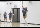 Viking True Hackenmiller sends a jump serve over the net during Tuesday night's non-conference game against RRMR.