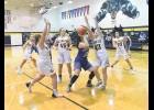 Lady Viking Olivia Stilley takes the ball down low against North Butler last Tuesday night in Greene. Stilley helped the team on the boards last week pulling down 10 rebounds in two games.