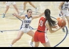 Viking Ashlyn Skellenger plays tight defense against St. Ansgar.