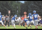 Vikings Hayzin Jacobson (1) and Alec Ducommun (50) combine for a tackle during Friday night's game against West Bend.