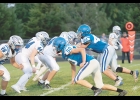 Vikings Alec Ducommun (50) and Brady Christianson (44) battle at the line during Friday night’s homecoming game. Photo by Mallory Rheingans