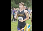 Bulldog Kaden Lee runs along the trail at the Osage Invitational.  Photos courtesy of Kathie Blake Photography.