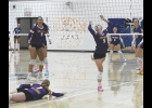 Bulldog Regan Eastvold bumps the ball back onto the court during action in Northwood on Thursday night.