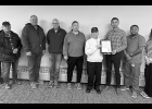 Taking part at the Manly Home Base Iowa designation were (from left) Philip Hackbart; Pete Andera, Manly City Council; Tom Reid, Director of Worth County Veterans Affairs; Joe Ryan, Manly City Council; Richard Baird, Manly City Council; Robert Haege III, Home Base Iowa Program Manager; Paul Andres, Local Veteran Employment Representative, Iowa Workforce Development; (not pictured) Melissa Michaelis, Executive Director, Winn-Worth Betco; and Rita Baird, citizen of Manly.