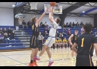 Viking Caysen Chodur puts up a shot in the paint during Monday night's game against West Bend Mallard.