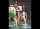 Viking Aydan Schutz looks for an open shot during a recent meet with Osage.