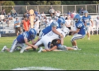 Viking freshman Martin Girouard in for a tackle with the help of Landen Nelson.