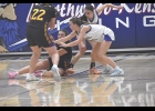 Viking Avarie Skellenger battles for a loose ball during Monday night's game against West Bend Mallard.