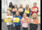 Seventh grade students with their pi projects.