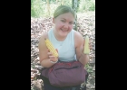 Sidney Schilling holds corn at Lady Jane's Cocoa and Maize (Corn) Farm in the Eastern region of Ghana.