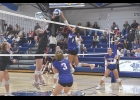 Viking sophomore Mia Fierova battles at the net during Tuesday night's game against Riceville.