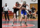 Brandon Varner, 145-pounder, uses the leg of N-P’s Mckade Munn to try to put him on the mat last Thursday night in Sheffield. Munn recovered from Varner’s offensive moves and won by fall. 