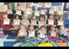 Pictured below are students in Northwood-Kensett Elementary classrooms that showing off and reading the latest round of free books that they received courtesy of community donations. Beginning last fall, every student at the elementary school has received a free book once a month thanks to donations from community business, groups and families. This month, the books were made possible by Larry and Jodi Porter.